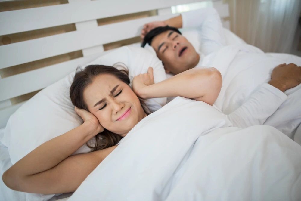 sleep apnea and snoring affecting a couple’s sleep quality